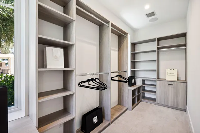 a bathroom with a sink toilet a mirror and vanity