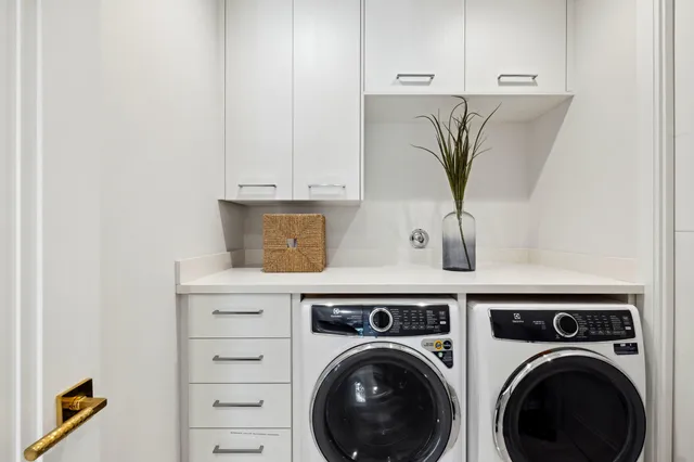 a bathroom with a shower sink and mirror