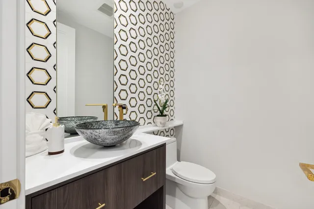 a bathroom with a shower and a sink