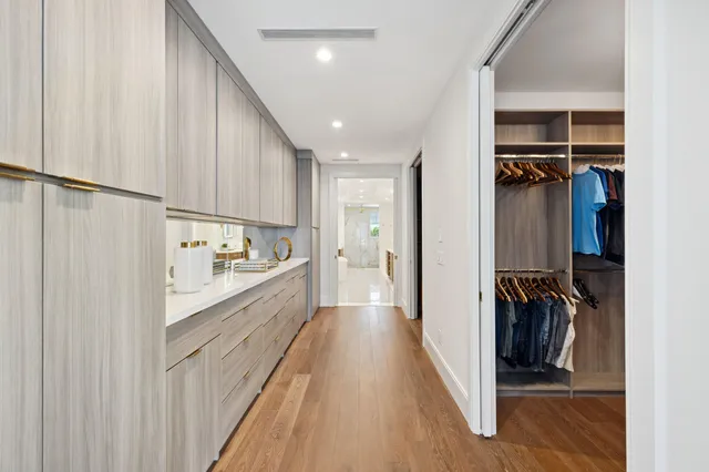 a picture of city view with lot of cars parked