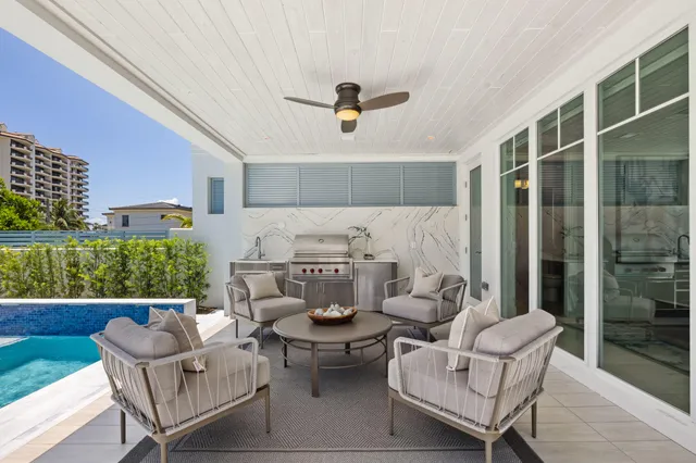 a bedroom with a bed and a potted plant