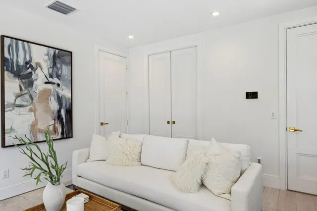 a kitchen with stainless steel appliances granite countertop a stove and a center island
