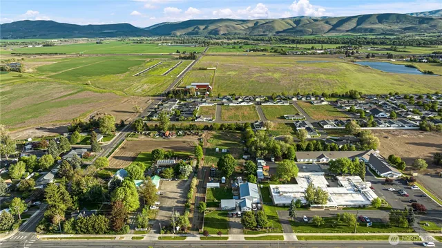 a view of a city with an ocean view