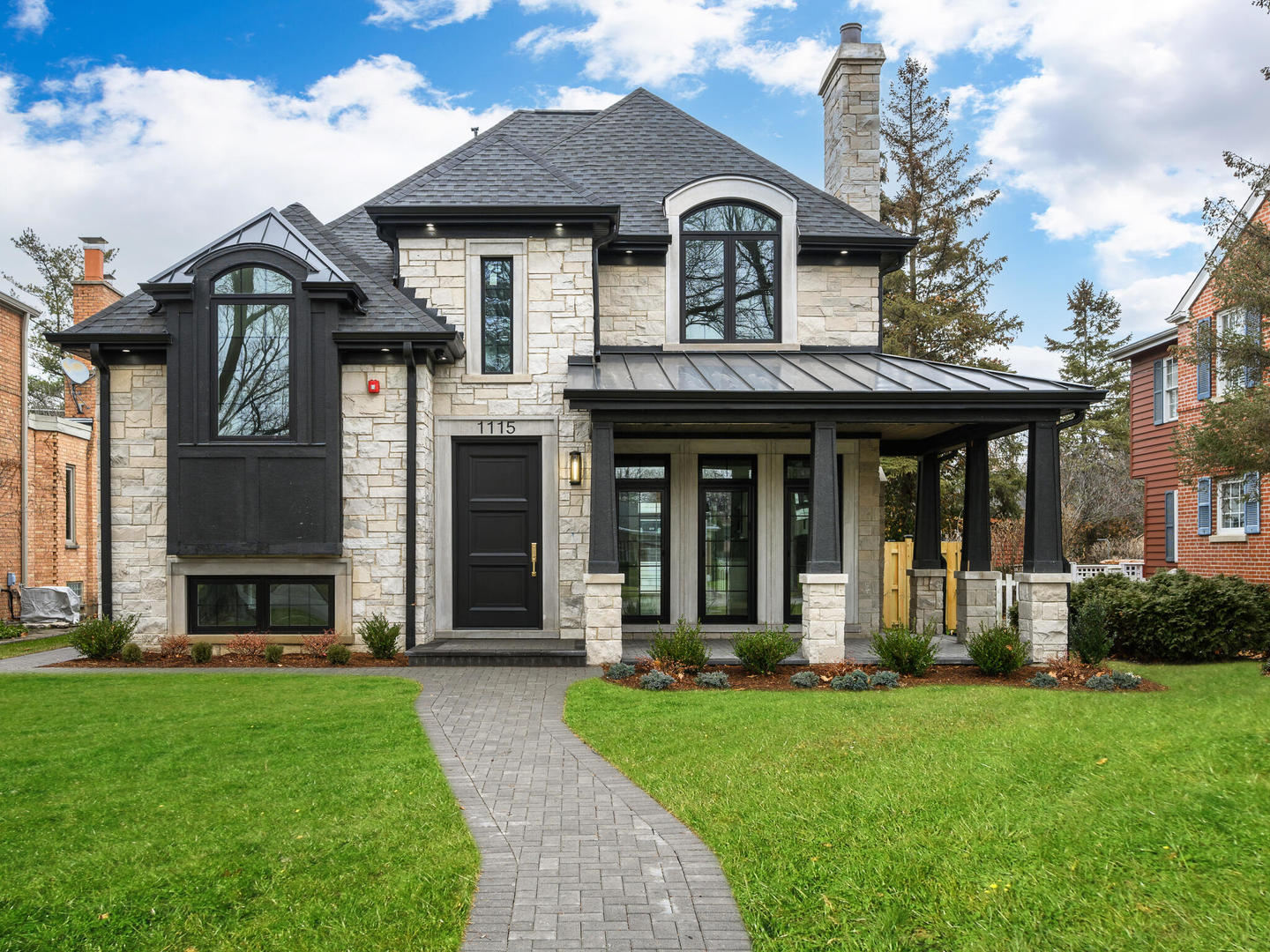 front view of a house with a yard