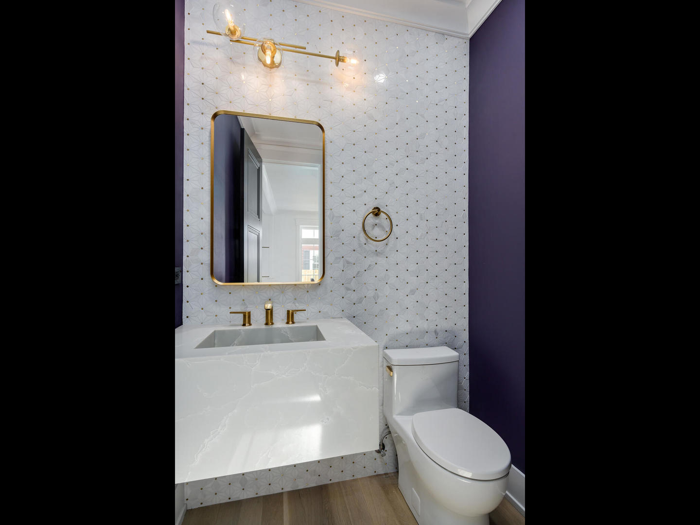 1115 South Delphia Avenue Park Ridge, IL 60068 - Photo 18 of 38 a bathroom with a toilet sink vanity and mirror