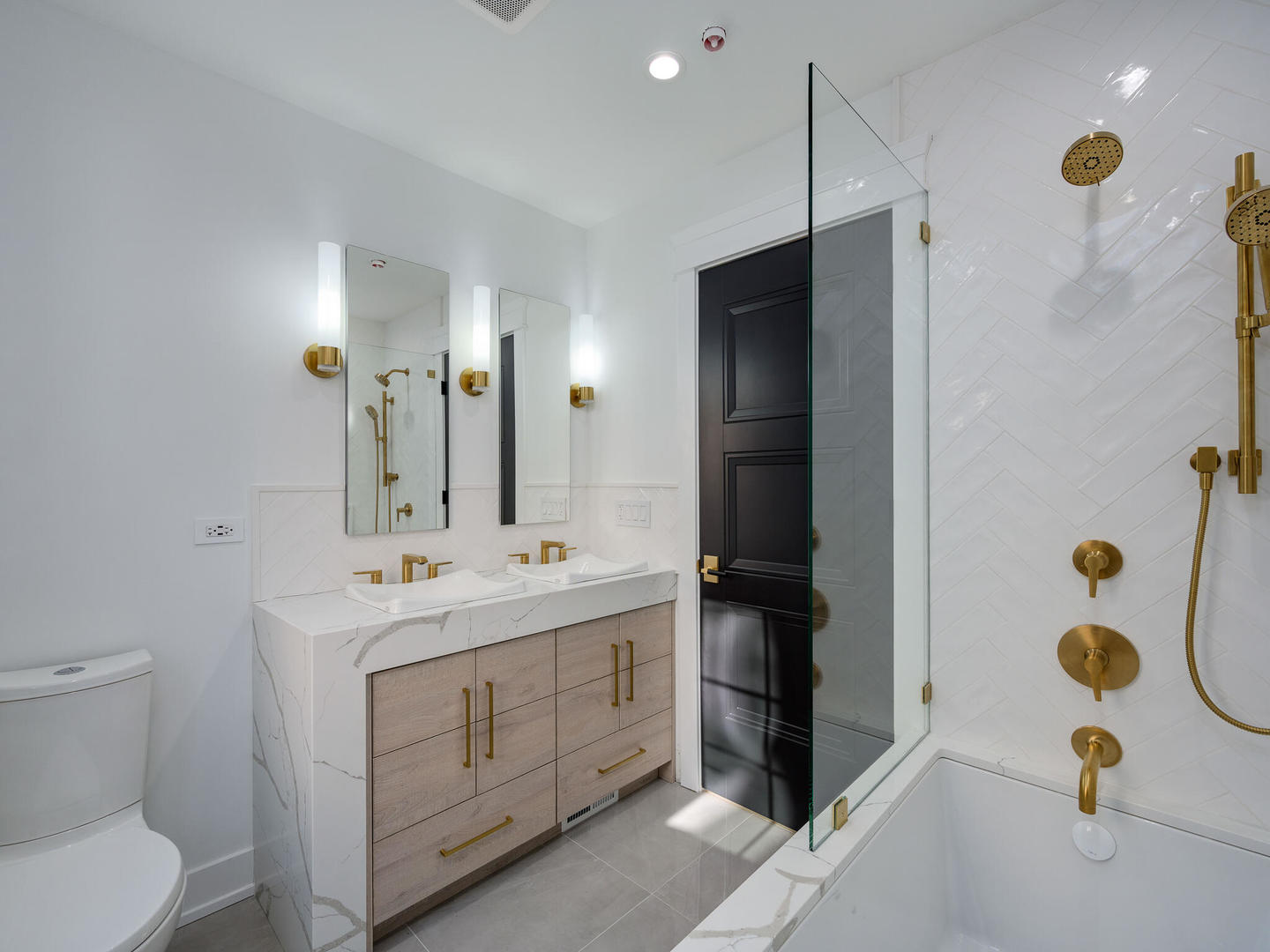 1115 South Delphia Avenue Park Ridge, IL 60068 - Photo 21 of 38 a bathroom with a sink a toilet and shower