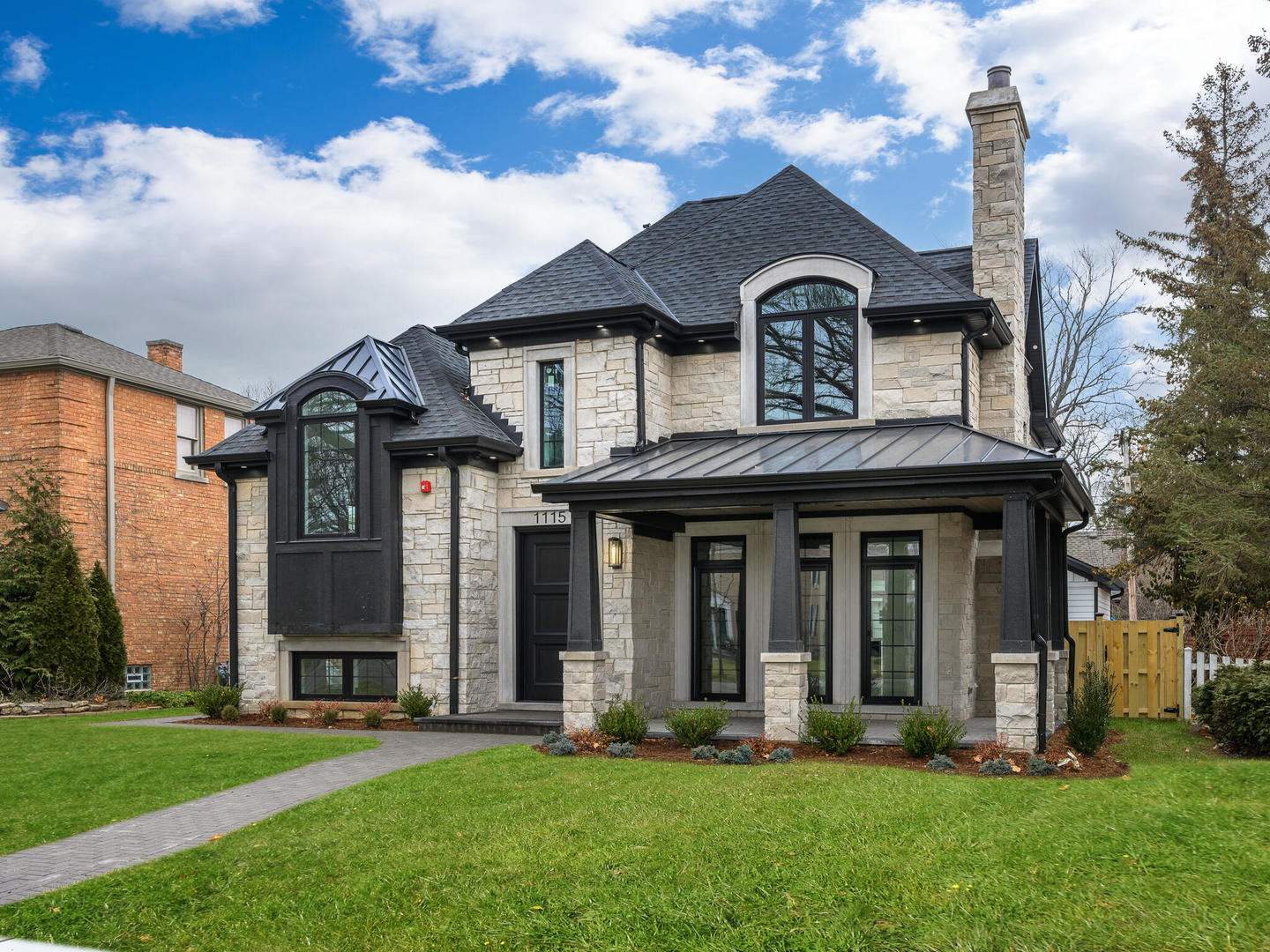 1115 South Delphia Avenue Park Ridge, IL 60068 - Photo 3 of 38 a front view of a house with garden