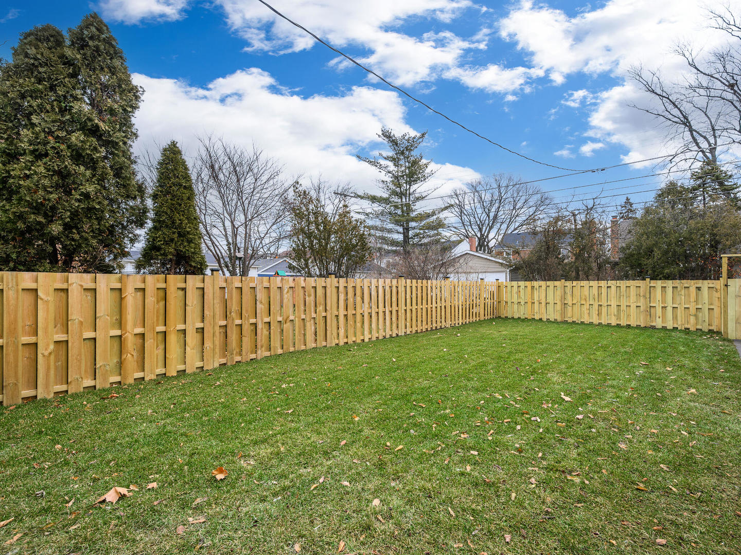 1115 South Delphia Avenue Park Ridge, IL 60068 - Photo 37 of 38 a view of a yard with wooden fence