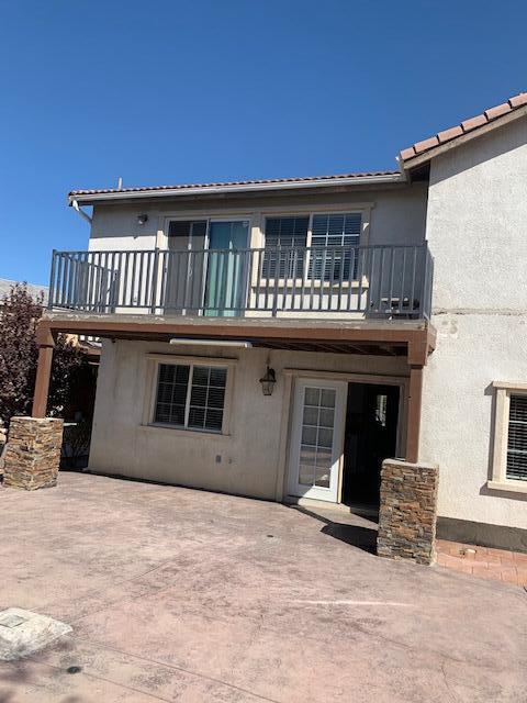 6148 Cecina Place Palmdale, CA 93552 - Photo 12 of 66 a front view of a house with entryway