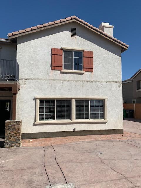 6148 Cecina Place Palmdale, CA 93552 - Photo 13 of 66 a front view of a house with a large window