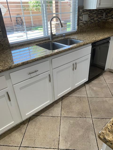6148 Cecina Place Palmdale, CA 93552 - Photo 22 of 66 a kitchen with granite countertop a sink and a stove