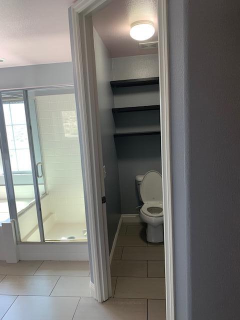 6148 Cecina Place Palmdale, CA 93552 - Photo 43 of 66 a bathroom with a toilet