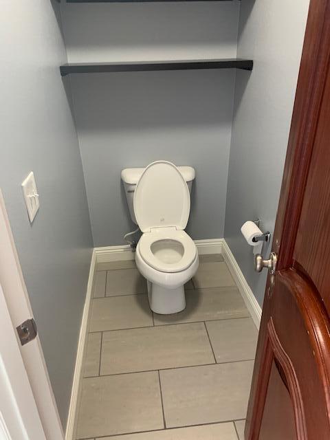 6148 Cecina Place Palmdale, CA 93552 - Photo 44 of 66 a white toilet sitting next to a toilet