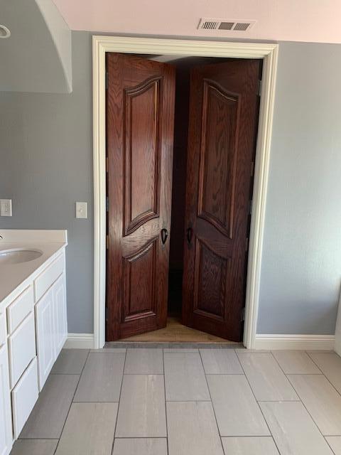 6148 Cecina Place Palmdale, CA 93552 - Photo 48 of 66 a view of a kitchen with a sink and dishwasher