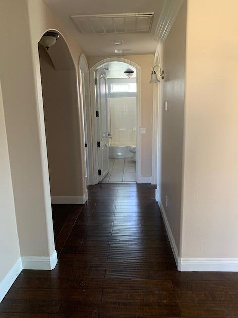 6148 Cecina Place Palmdale, CA 93552 - Photo 52 of 66 a view of a hallway with wooden floor