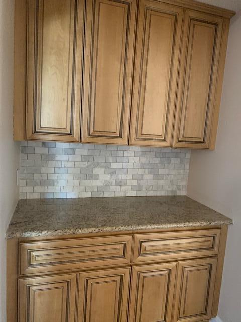 6148 Cecina Place Palmdale, CA 93552 - Photo 53 of 66 a view of a sink and cabinets