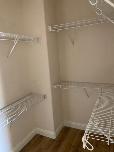 6148 Cecina Place Palmdale, CA 93552 - Photo 62 of 66 a view of an empty walk in closet