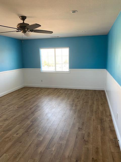 6148 Cecina Place Palmdale, CA 93552 - Photo 64 of 66 wooden floor in an empty room