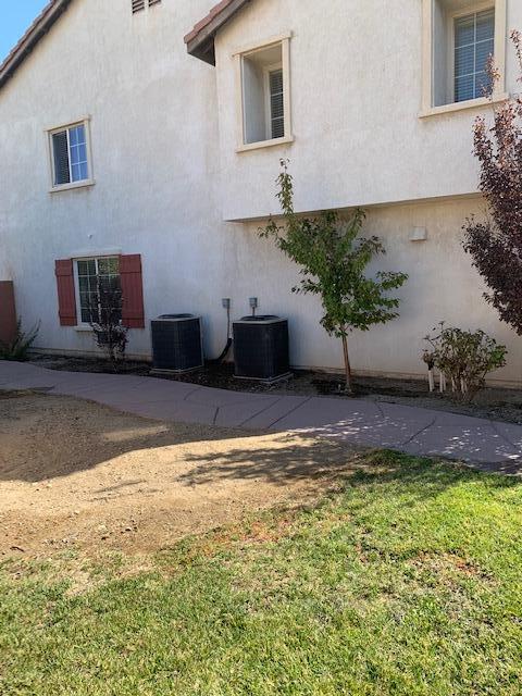 6148 Cecina Place Palmdale, CA 93552 - Photo 8 of 66 a view of a house with a swimming pool