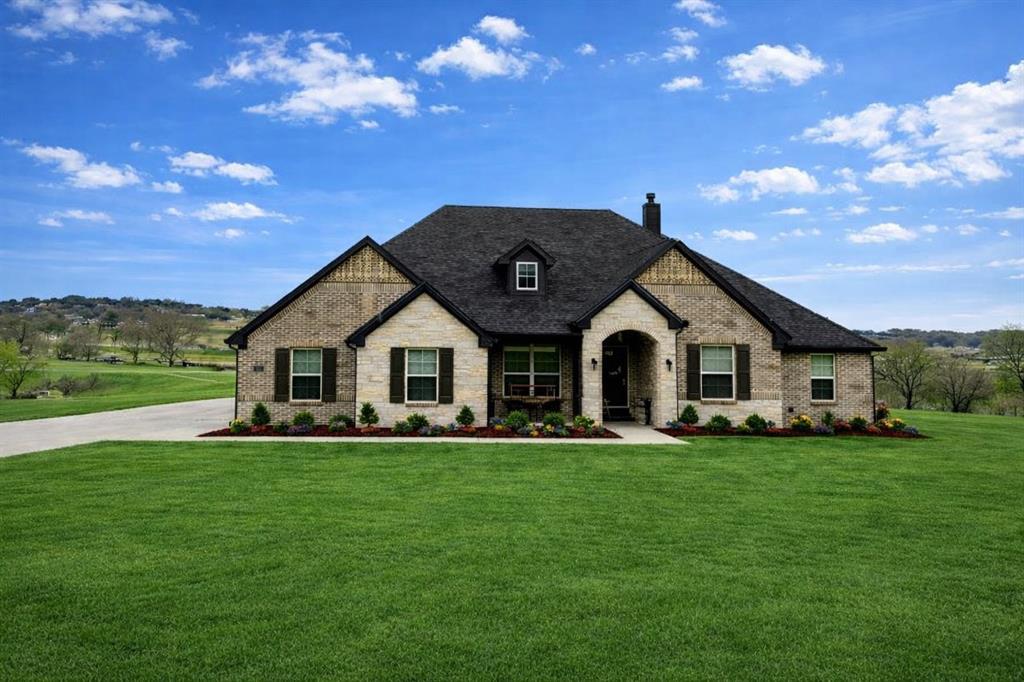 1037 Boulder Road Weatherford, TX 76085 - Photo 4 of 24 a view of a house with a yard