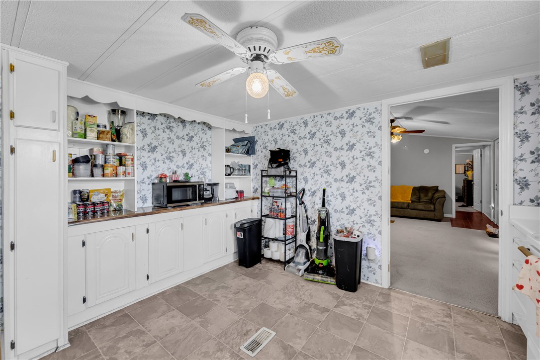 150 Newberry Road Walhalla, SC 29691 - Photo 13 of 47 Functional kitchen offering ample storage and an inviting flow to adjacent living spaces.