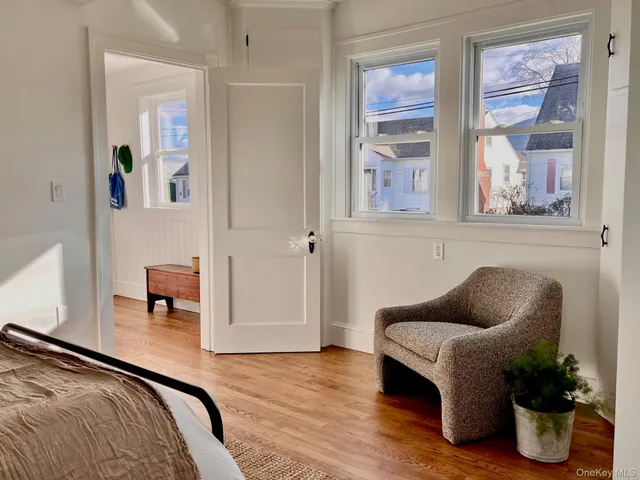 a bedroom with a bed and furniture