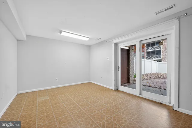 an empty room with windows