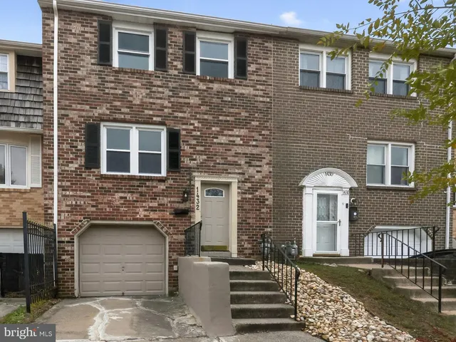 a front view of a house with a door