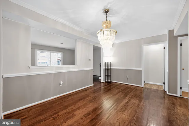 a view of a livingroom with wooden floor