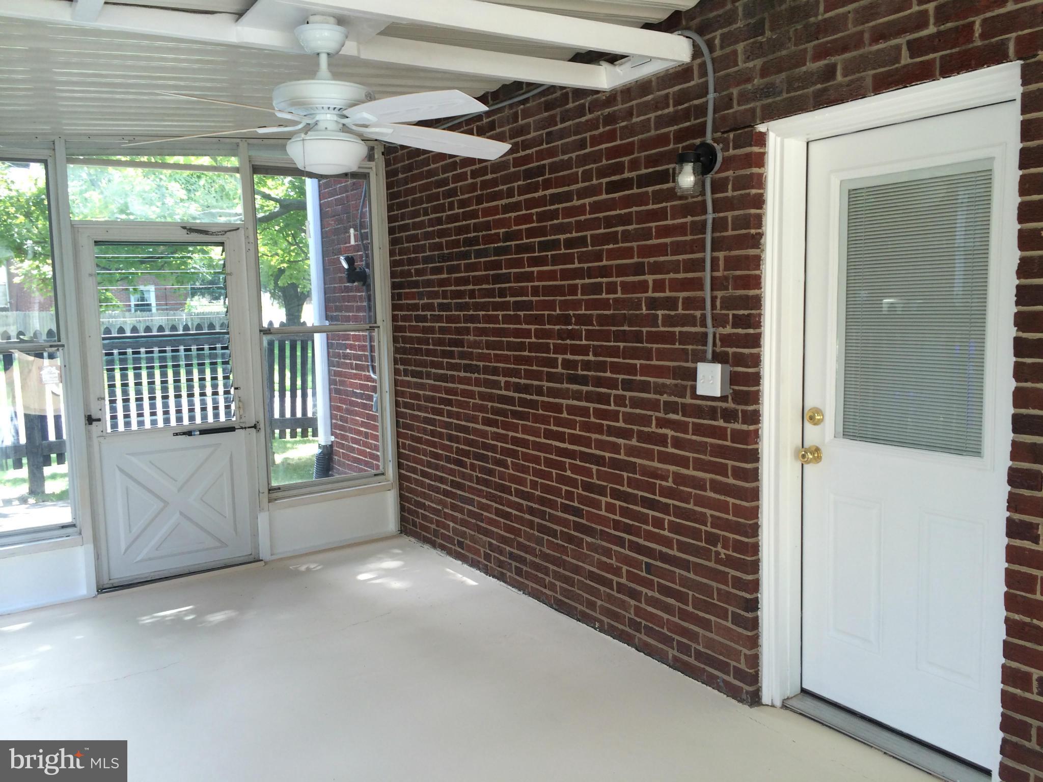 11701 Grandview Avenue Silver Spring, MD 20902 - Photo 7 of 30 Sunroom on Back of Home Off of Kitchen