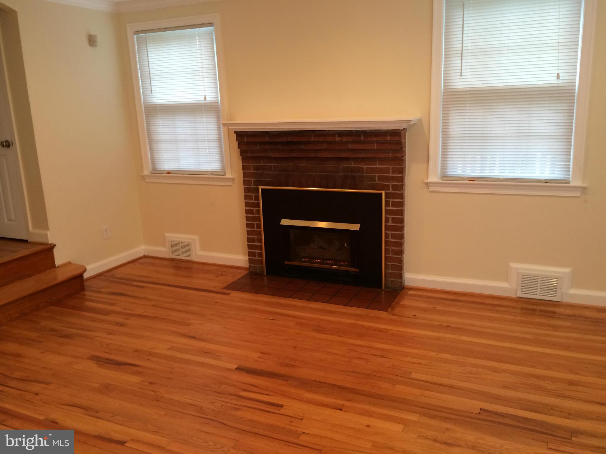 11701 Grandview Avenue Silver Spring, MD 20902 - Photo 8 of 30 Living Room With Refinished Hardwood Floors