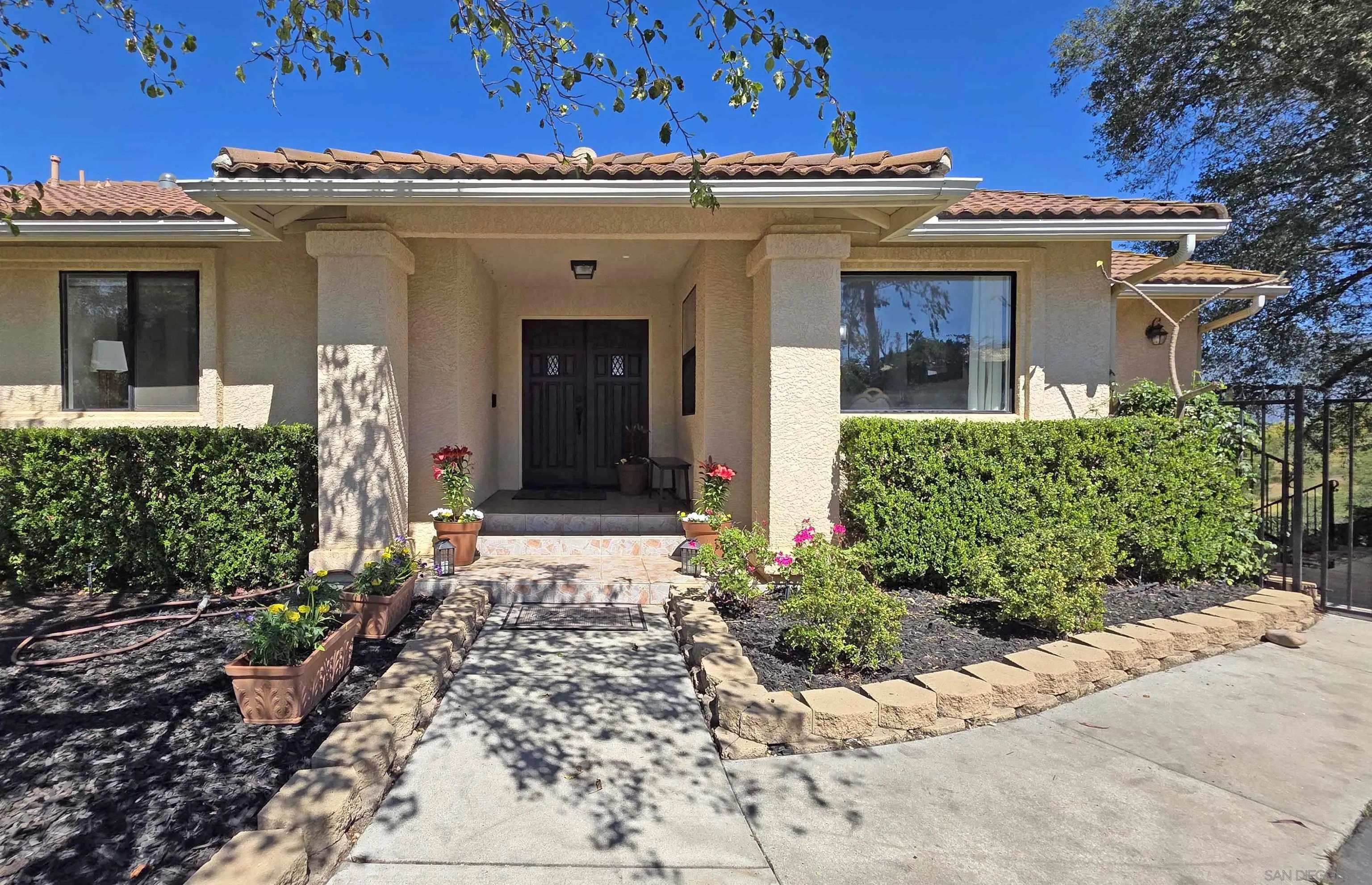 13588 McNally Road Valley Center, CA 92082 - Photo 3 of 43 front view of a house