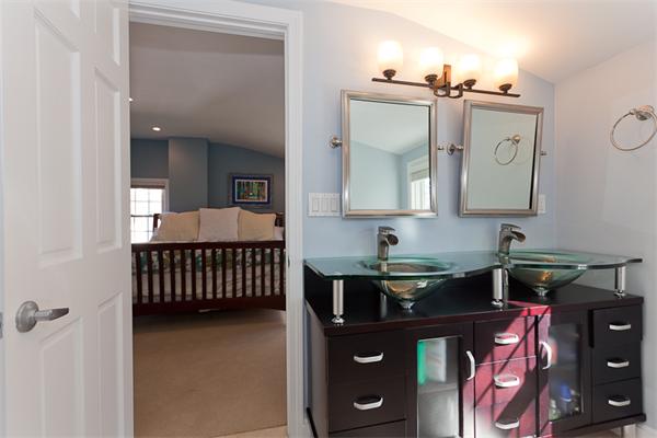 231 Ridge Street Arlington, MA 02474 - Photo 14 of 22 a bathroom with a sink and a mirror