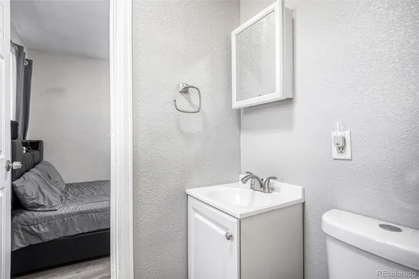 a bathroom with a sink and a toilet