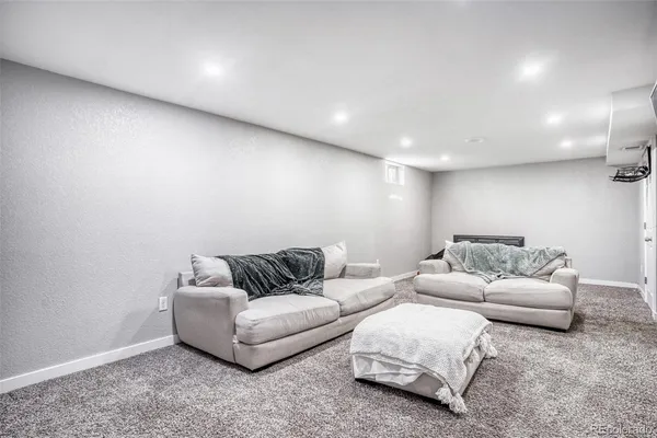 a living room with furniture and a couch
