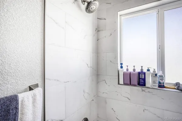 a view of a bathroom with a shower
