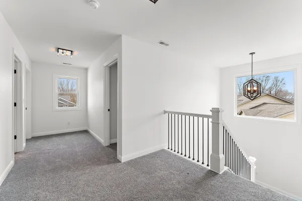 a view of a hallway with window