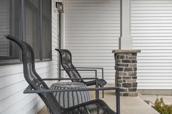 a view of balcony with chairs