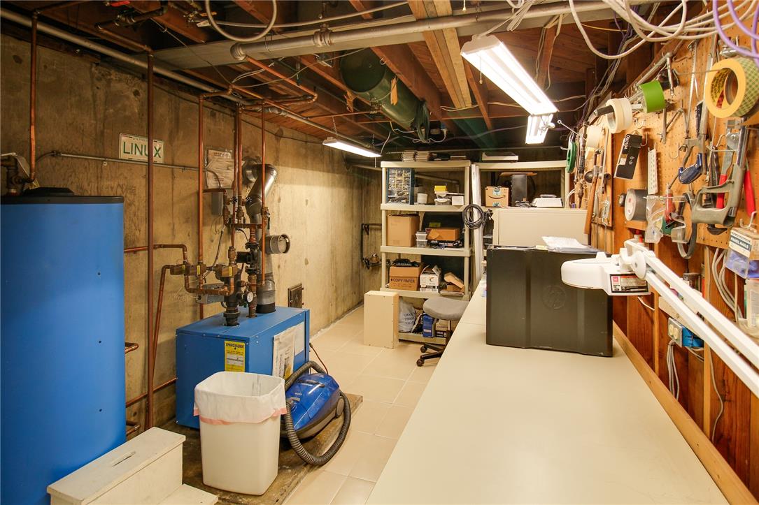 1256 Ridge Avenue Whitehall, PA 18052 - Photo 42 of 43 A well-lit utility area offers ample workspace and efficient mechanical systems.