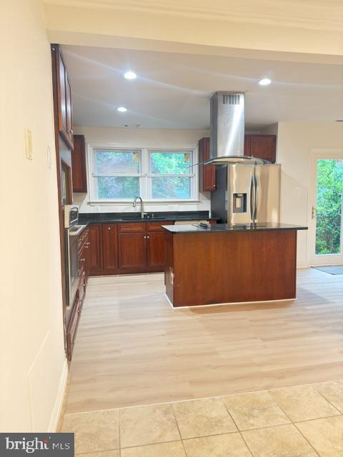 7135 Oak Ridge Road Falls Church, VA 22042 - Photo 14 of 41 a large kitchen with kitchen island a sink stainless steel appliances and cabinets