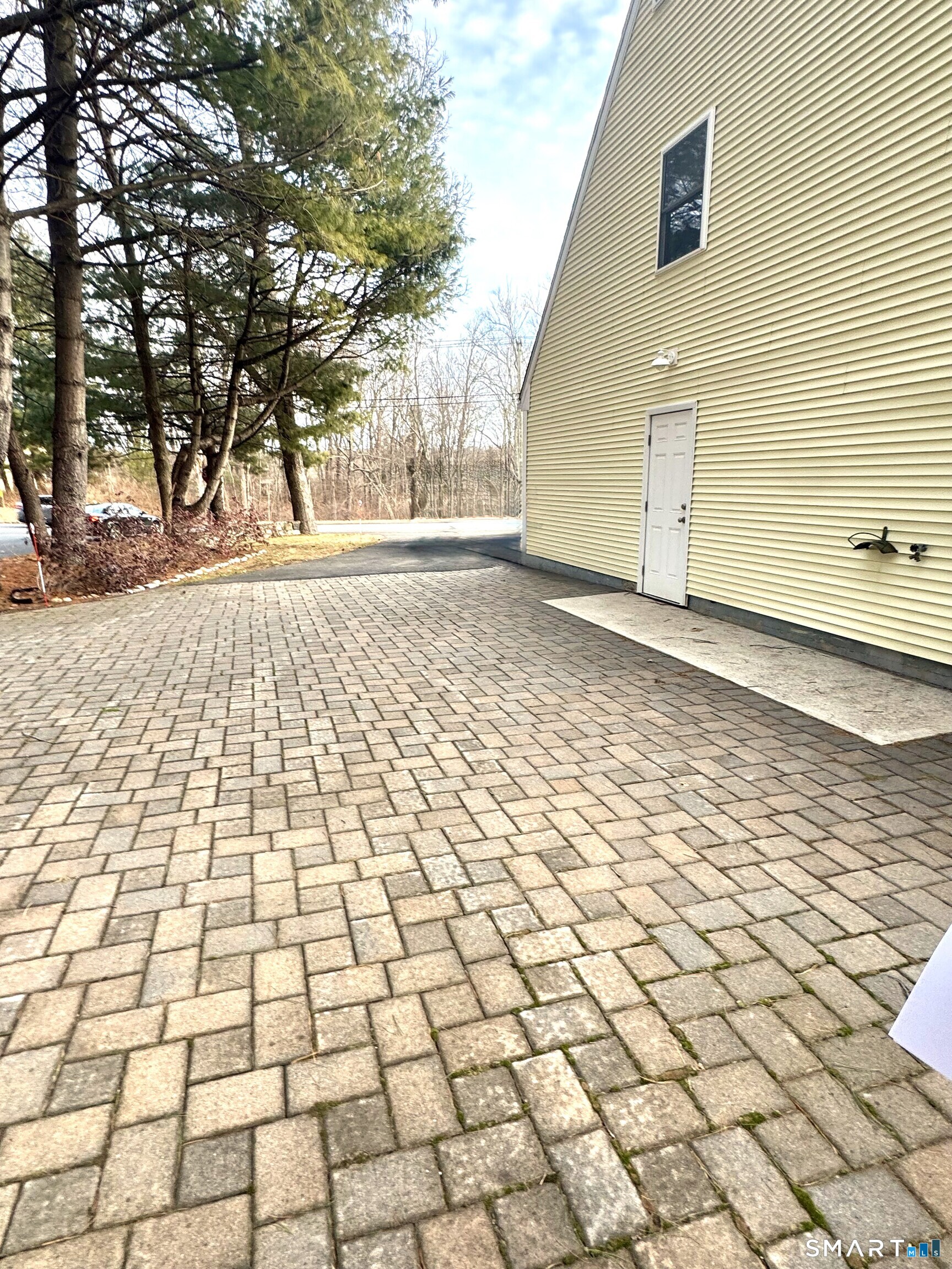 29 Lovely Street Canton, CT 06019 - Photo 31 of 39 Huge paver patio and parking facing side street