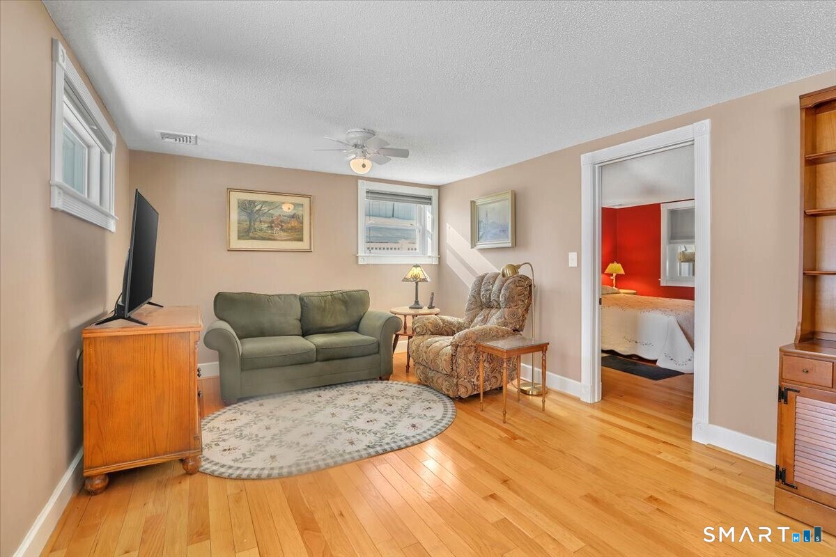 29 Lovely Street Canton, CT 06019 - Photo 5 of 39 View of main floor bedroom off of the living room