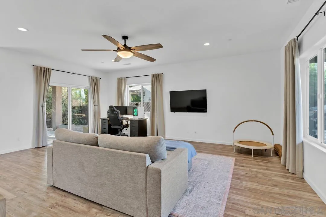 130 Scenic Drive El Cajon, CA 92021 - Photo 13 of 50 a living room with furniture and a flat screen tv