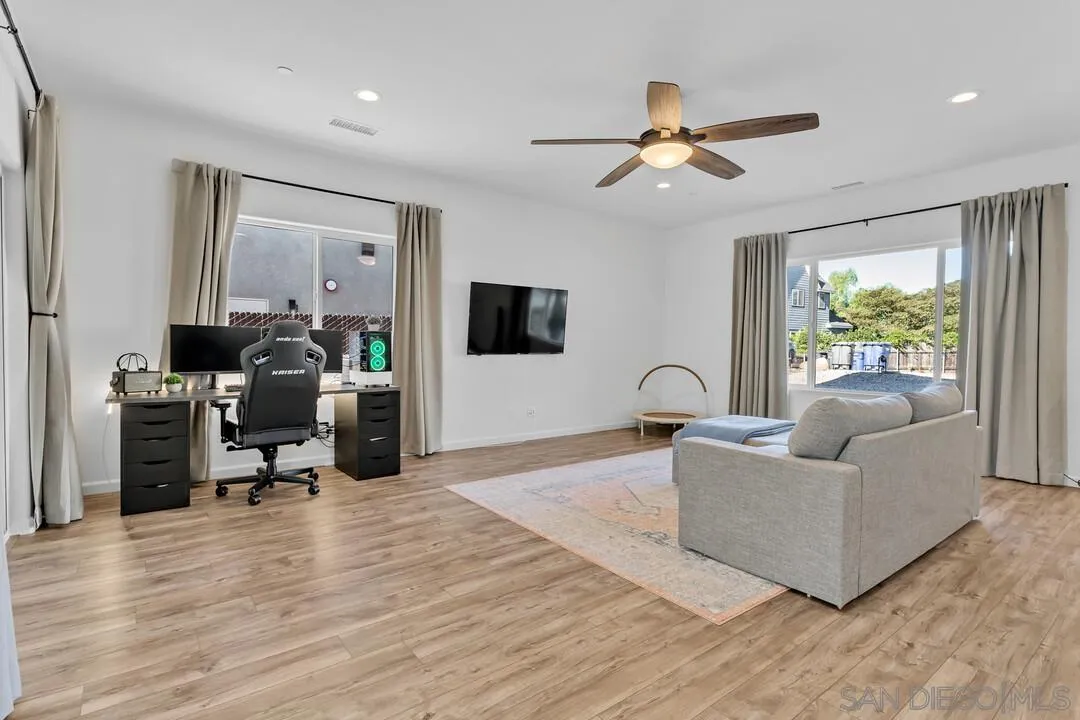 130 Scenic Drive El Cajon, CA 92021 - Photo 15 of 50 a living room with furniture and a flat screen tv