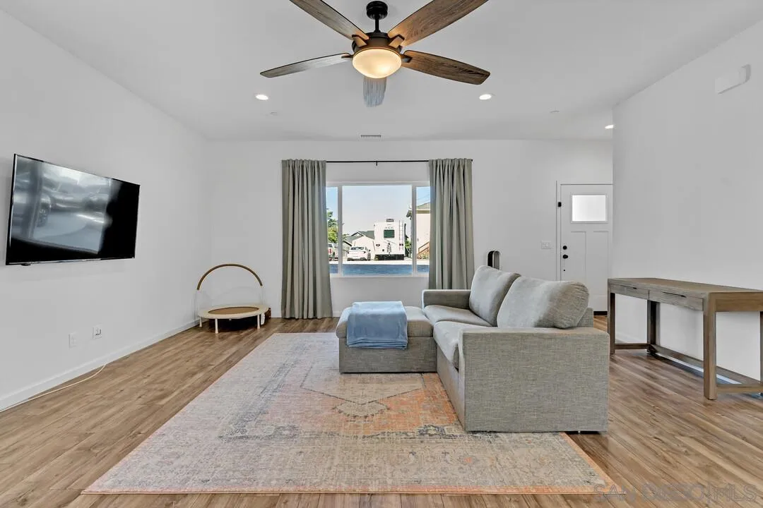 130 Scenic Drive El Cajon, CA 92021 - Photo 16 of 50 a living room with furniture and a flat screen tv