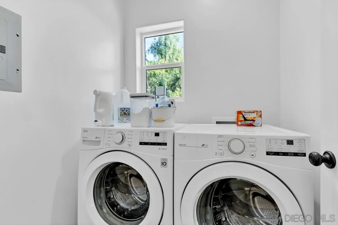 130 Scenic Drive El Cajon, CA 92021 - Photo 18 of 50 a utility room with dryer and washer