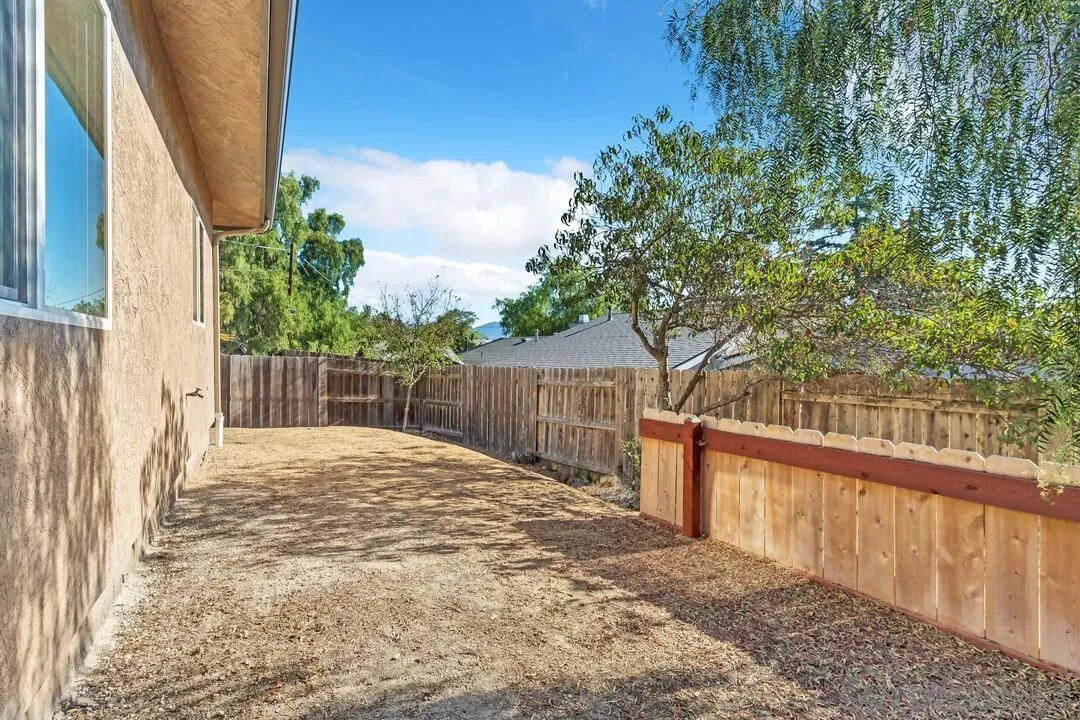 130 Scenic Drive El Cajon, CA 92021 - Photo 36 of 50 a white house that has tree in front of it