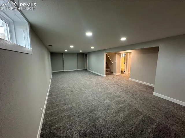 a view of hallway with a window