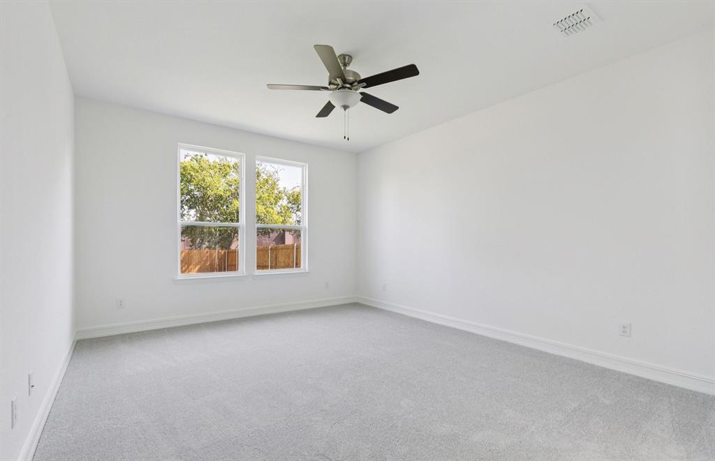 444 Avian Way Godley, TX 76044 - Photo 11 of 22 Owner's suite with large windows