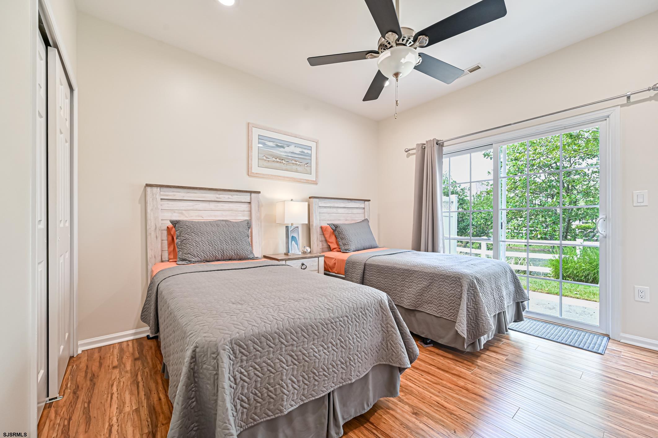 27 Ables Run Drive Absecon, NJ 08201 - Photo 18 of 28 a bedroom with two beds and a large window